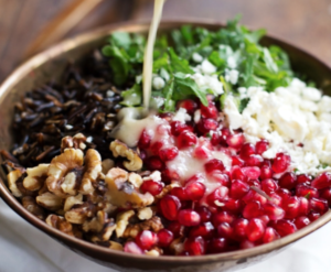 pomegranate, kale, and wild rice salad with walnuts and feta